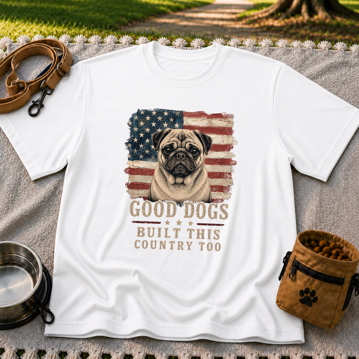 White T-shirt mockup featuring pug portrait against a distressed American flag with patriotic lettering.
