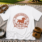 a Dachshund running inside a “Ranch Heritage” western emblem. On a White T-shirt.