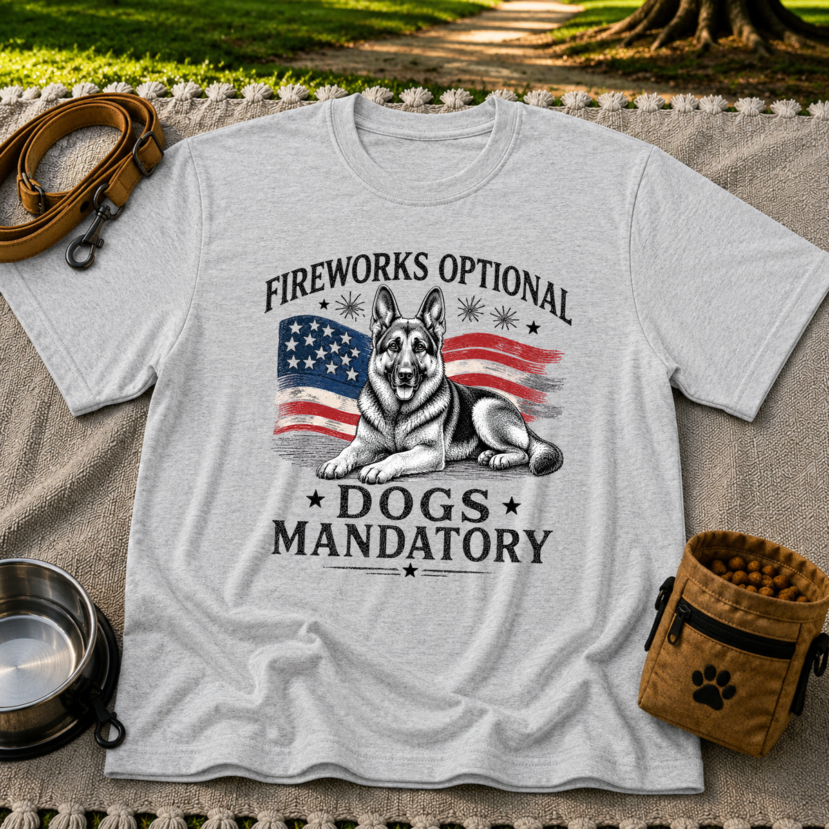 a German Shepherd beside “Fireworks optional, dogs mandatory”. On a Sport Grey T-shirt.