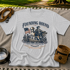 a founding-era American scene with hounds and patriotic details. On a Sport Grey T-shirt.