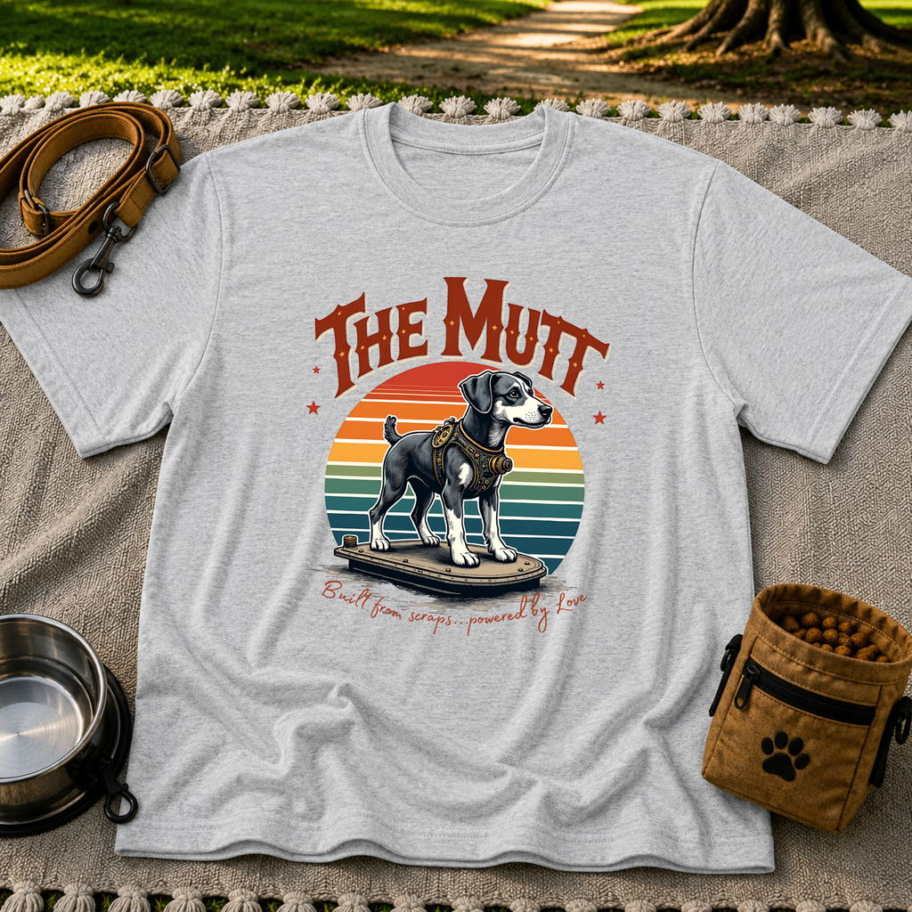 a mixed-breed dog above a “built from scraps, powered by love” sentiment. On a Sport Grey T-shirt.