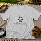 a paw and a “work hard so my dog can have nice things” message. On a Sport Grey T-shirt.