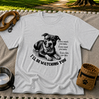 a watchful dog paired with a line about keeping an eye on you. On a Sport Grey T-shirt.