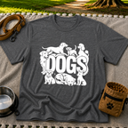 the word “Dogs” surrounded by several dog portraits. On a Dark Heather Grey T-shirt.