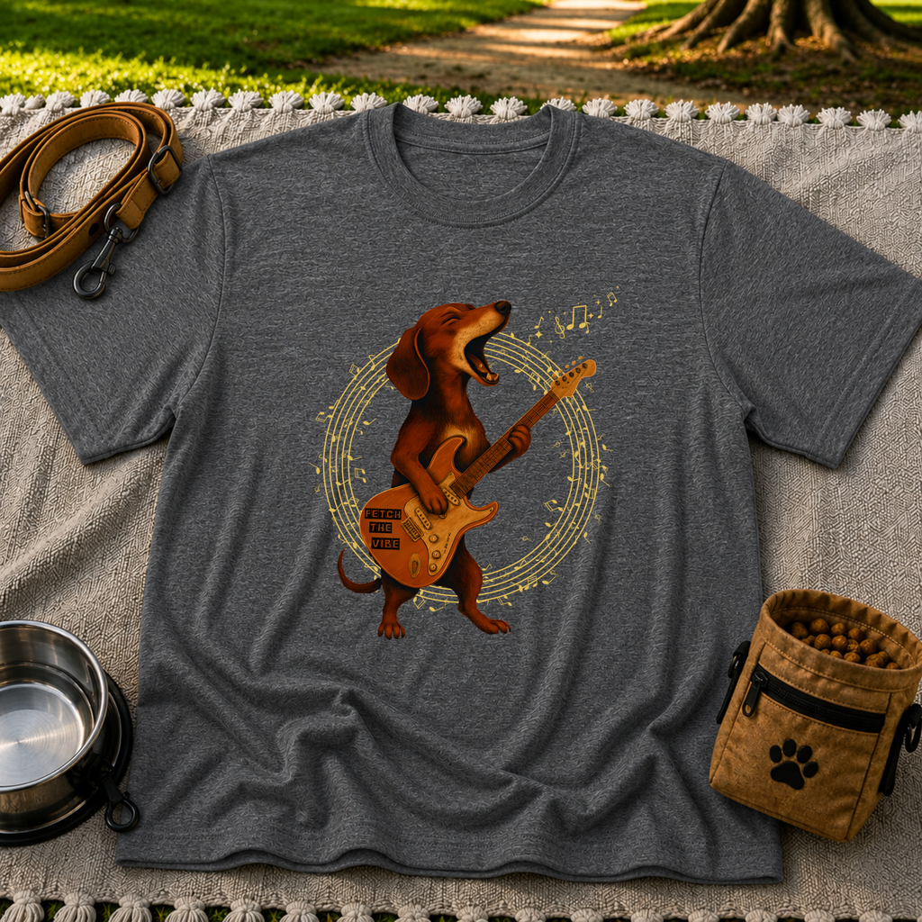 Rockin’ Dachshund Guitar artwork on a Dark Heather Grey T-shirt.