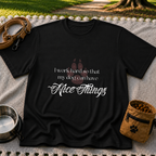 a paw and a “work hard so my dog can have nice things” message. On a Black T-shirt.