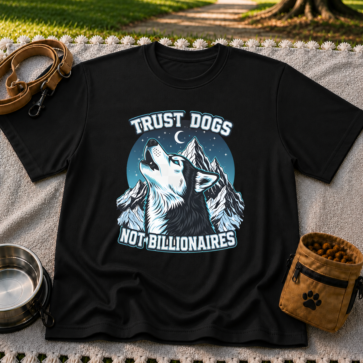 Black T-shirt mockup featuring howling Husky against a rugged blue-toned mountain landscape.