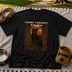 Black cat, moonlike circle and surrounding stars on a Black T-shirt.