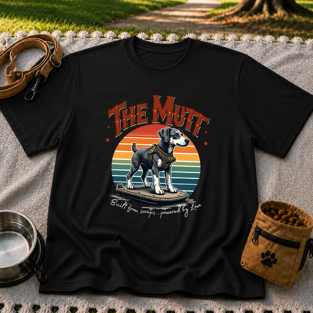 a mixed-breed dog above a “built from scraps, powered by love” sentiment. On a Black T-shirt.
