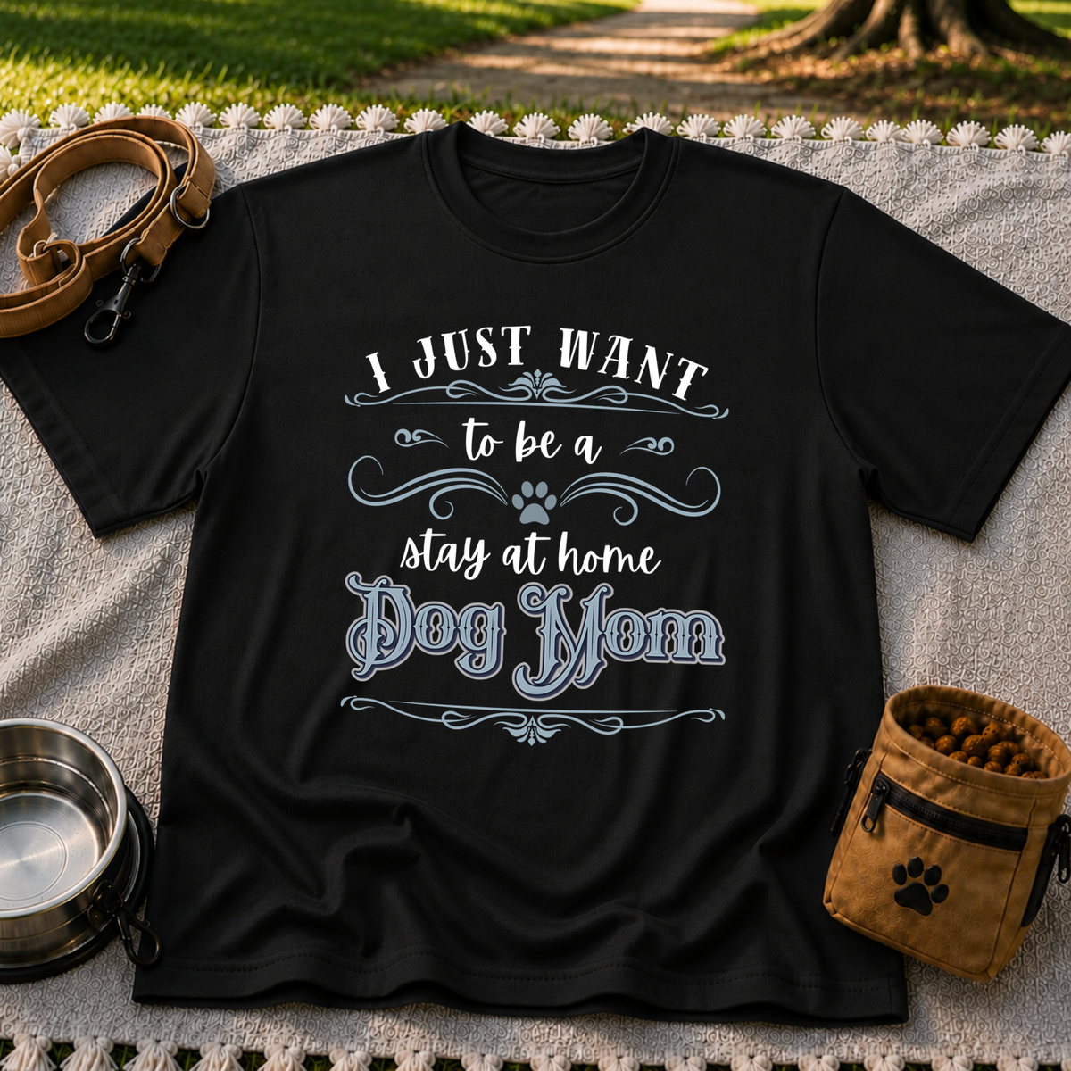 the phrase “I just want to be a stay at home dog mom”. On a Black T-shirt.