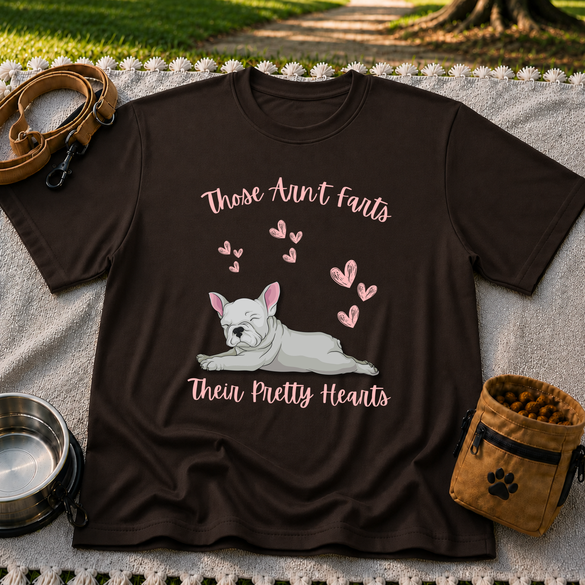 Dark Chocolate T-shirt mockup featuring reclining French Bulldog surrounded by pink hearts and the Pretty Hearts joke.