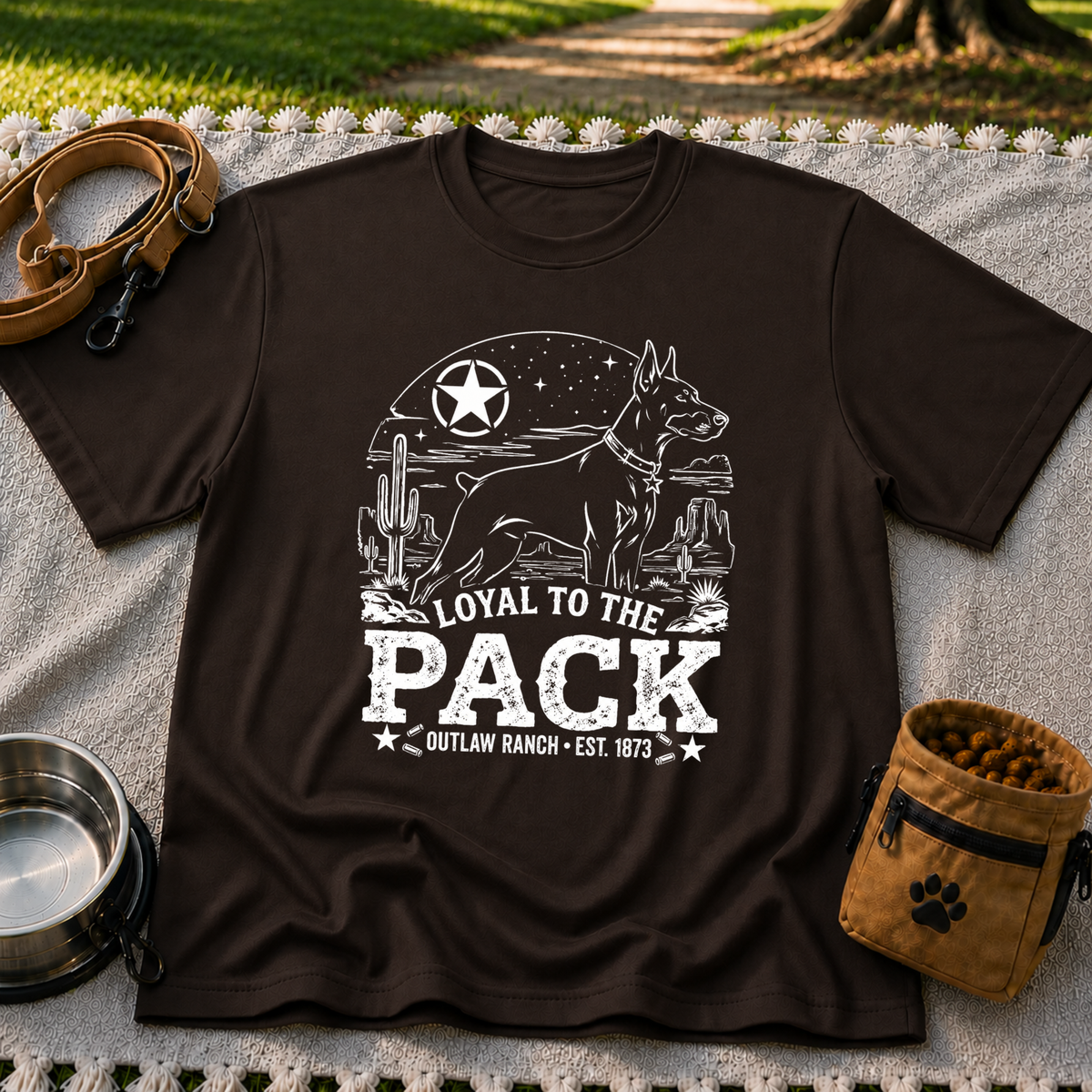a ranch dog inside a “Loyal to the Pack” western badge. On a Dark Chocolate T-shirt.