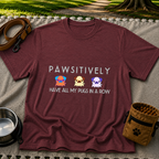 a row of three pugs beneath “Pawsitively all my pugs in a row”. On a Maroon T-shirt.