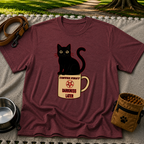 Maroon T-shirt mockup featuring black cat sitting on a Coffee First Darkness Later mug.