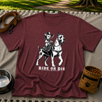 Maroon T-shirt mockup featuring cowboy-hat Chihuahua riding a Great Dane above Ride or Die lettering.