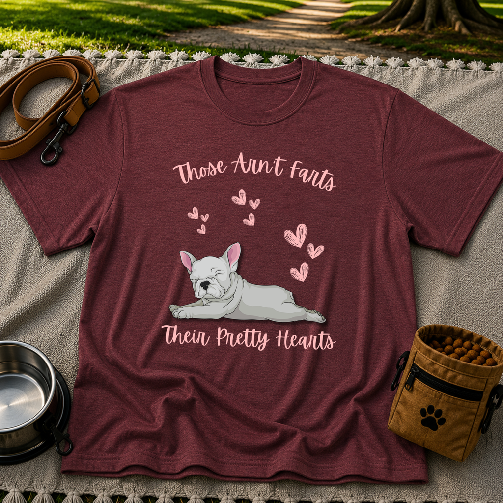 Maroon T-shirt mockup featuring reclining French Bulldog surrounded by pink hearts and the Pretty Hearts joke.