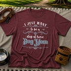 the phrase “I just want to be a stay at home dog mom”. On a Maroon T-shirt.