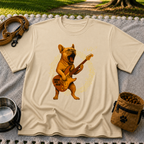 Rocking French Bulldog Guitar artwork on a Sand T-shirt.