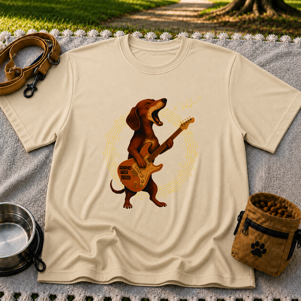 Rockin’ Dachshund Guitar artwork on a Sand T-shirt.