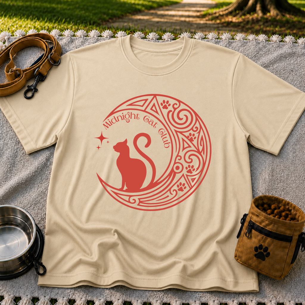 Midnight Cat Club Moon artwork on a Sand T-shirt.