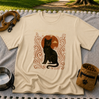 Black cat, moonlike circle and surrounding stars on a Sand T-shirt.