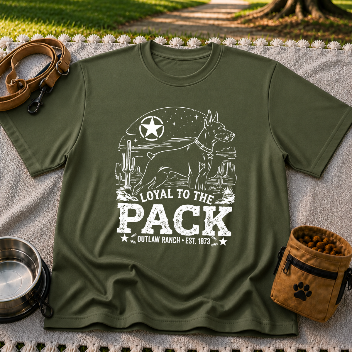 a ranch dog inside a “Loyal to the Pack” western badge. On a Military Green T-shirt.