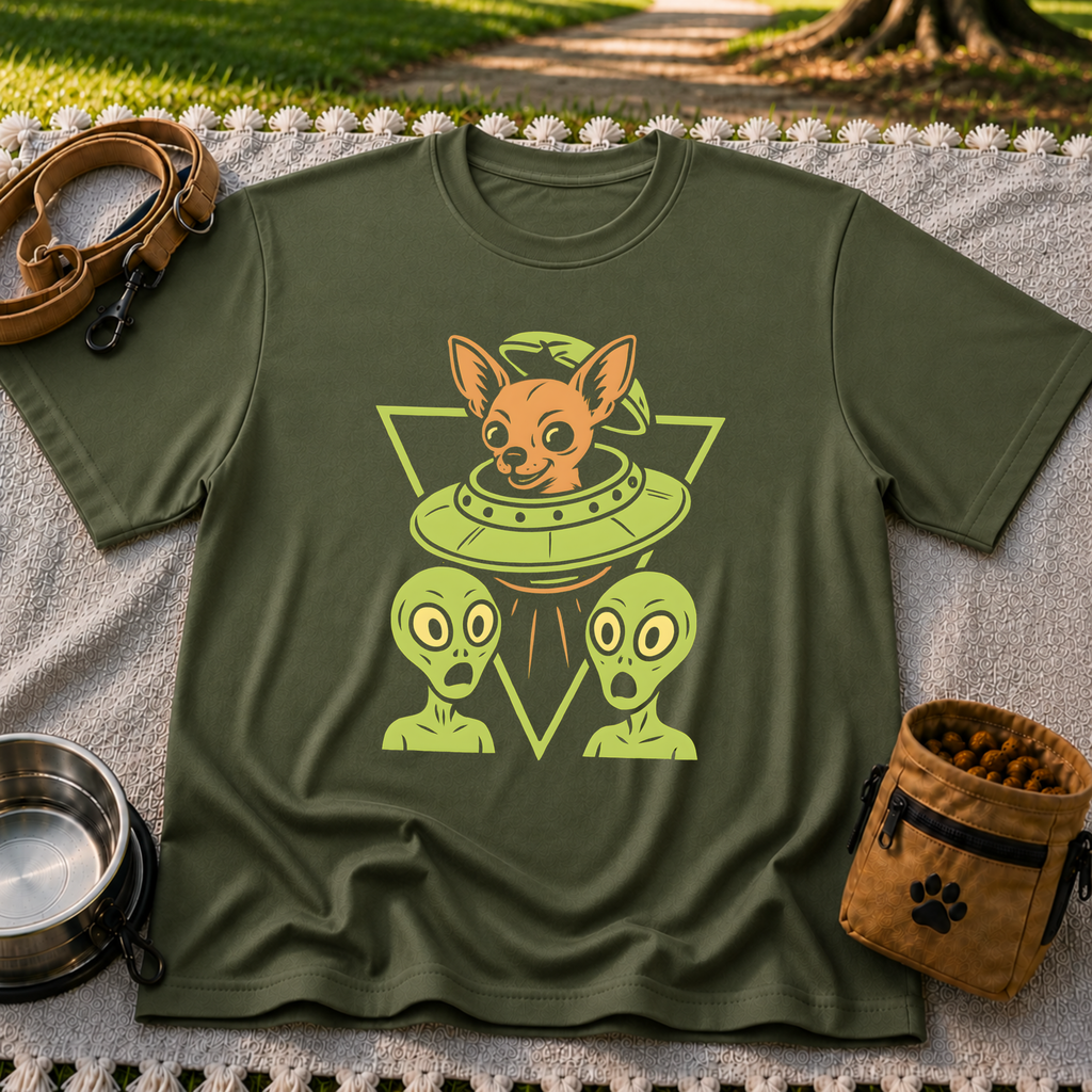 Military Green T-shirt mockup featuring oversized-eared Chihuahua in a flying saucer above two small aliens.