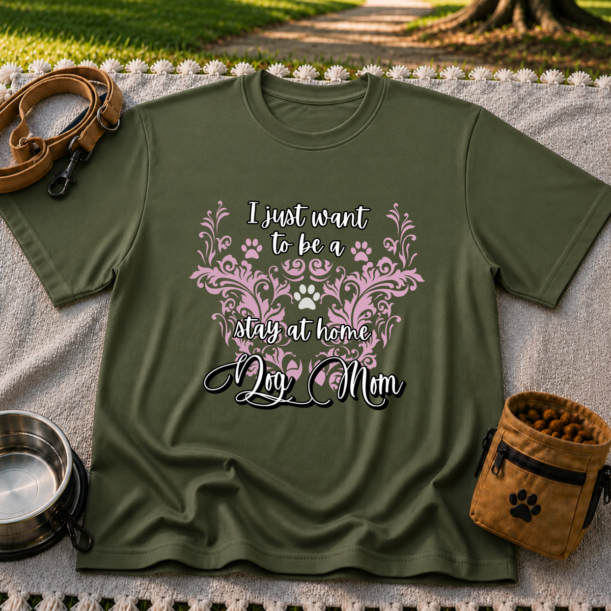 Stay at Home Dog Mom Pink design on a Military Green T-shirt.