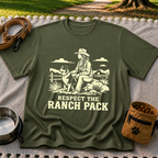 Military Green T-shirt mockup featuring western ranch scene with a rider, dog, open landscape, and Respect the Ranch Pack lettering.