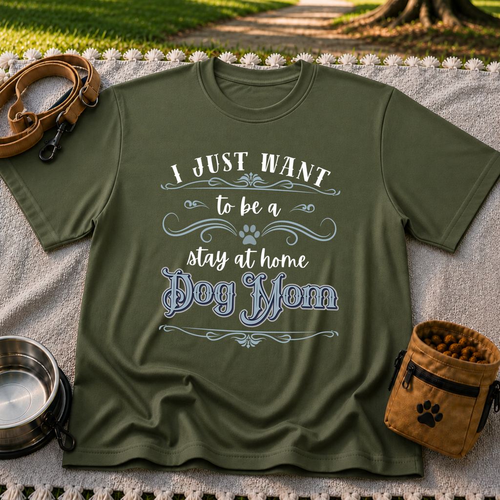 the phrase “I just want to be a stay at home dog mom”. On a Military Green T-shirt.