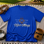 a paw and a “work hard so my dog can have nice things” message. On a Royal T-shirt.
