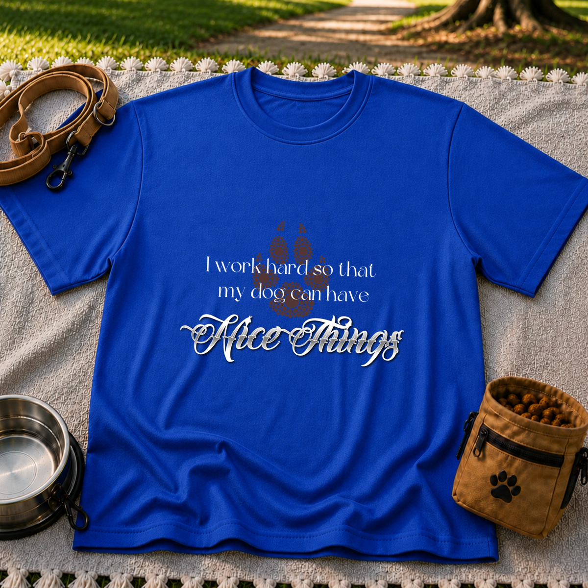 a paw and a “work hard so my dog can have nice things” message. On a Royal T-shirt.