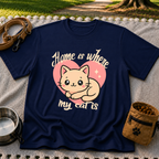 Navy T-shirt mockup featuring kawaii cat resting inside a pink heart with Home Is Where My Cat Is lettering.