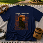 Black cat, moonlike circle and surrounding stars on a Navy T-shirt.