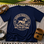 a Dachshund running inside a “Ranch Heritage” western emblem. On a Navy T-shirt.
