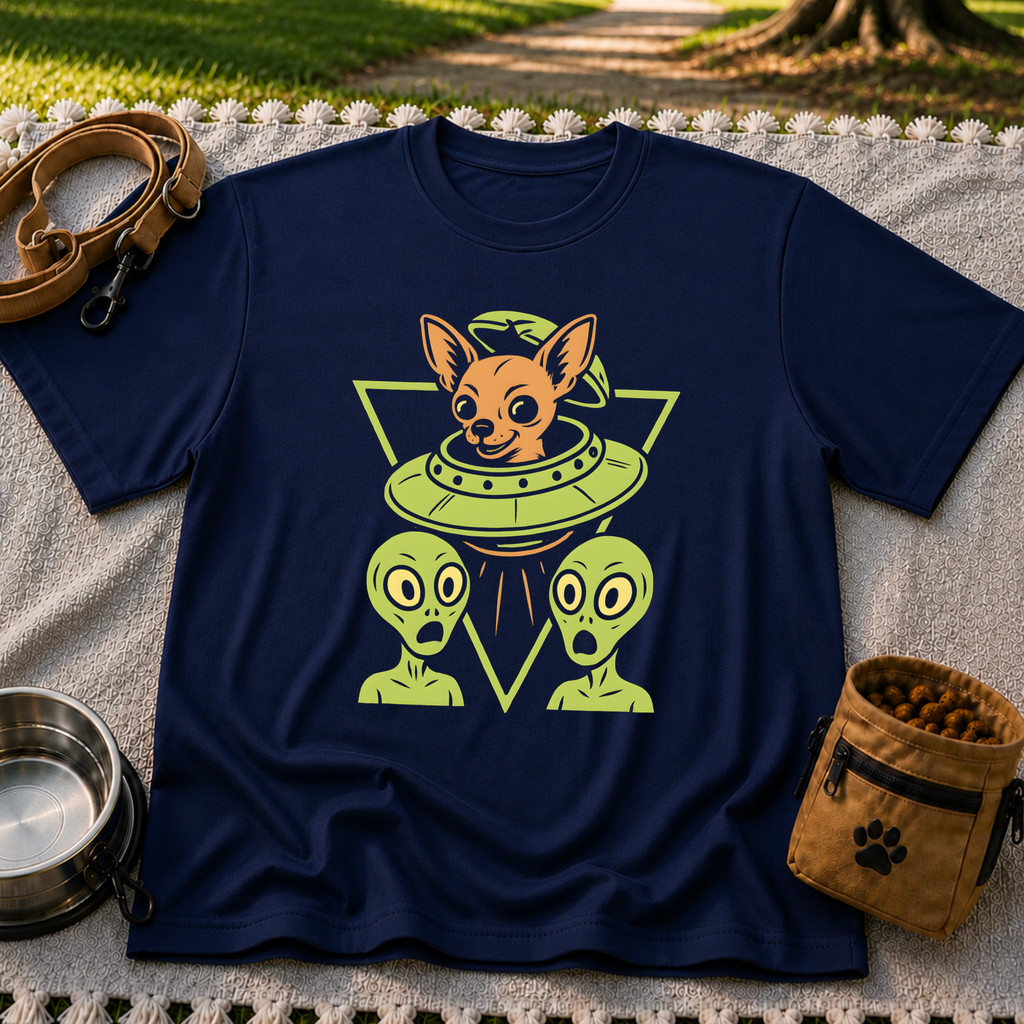 Navy T-shirt mockup featuring oversized-eared Chihuahua in a flying saucer above two small aliens.